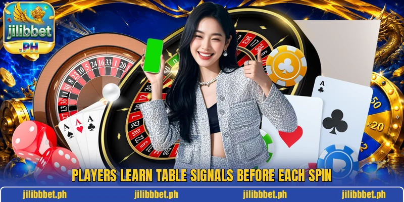 Players learn table signals before each spin